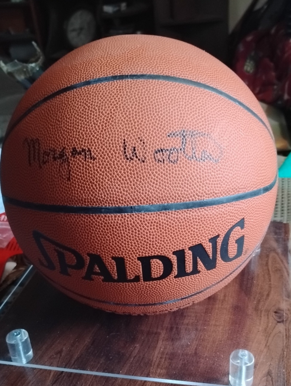 Spalding Orange Basketball with Black Logo Autographed by a Legend Head Coach